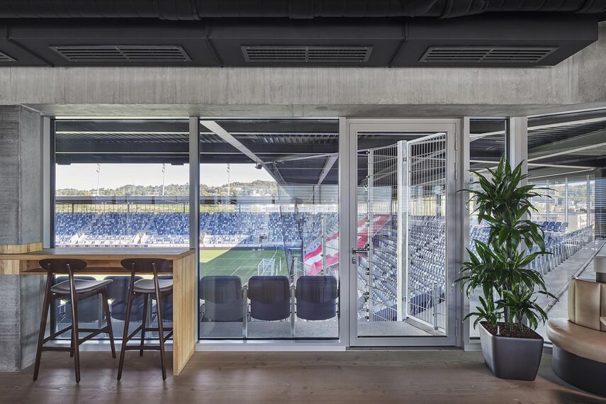 thermfix vario Facades, fuego light Windows, unico Doors, fuego light Doors and unico Windows - La Tuilière football stadium, Lausanne located in Lausanne, Switzerland
