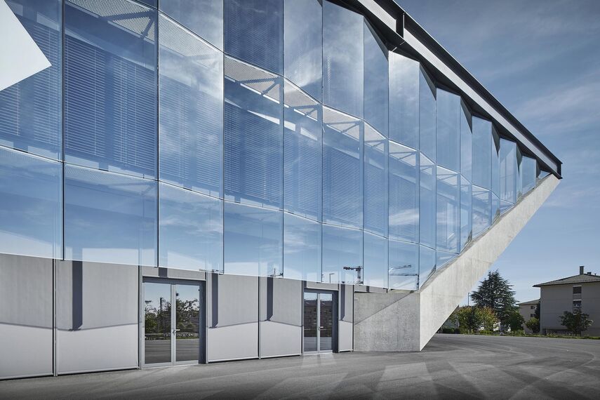 thermfix vario Facades, fuego light Windows, unico Doors, fuego light Doors and unico Windows - La Tuilière football stadium located in Lausanne, Switzerland