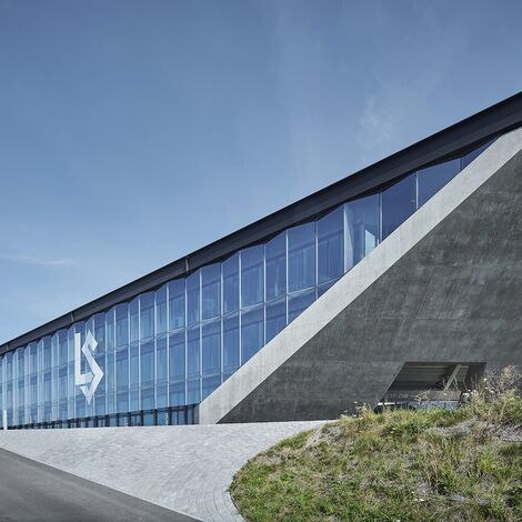 thermfix vario Facades, fuego light Windows, unico Doors, fuego light Doors and unico Windows - La Tuilière football stadium, Lausanne located in Lausanne, Switzerland