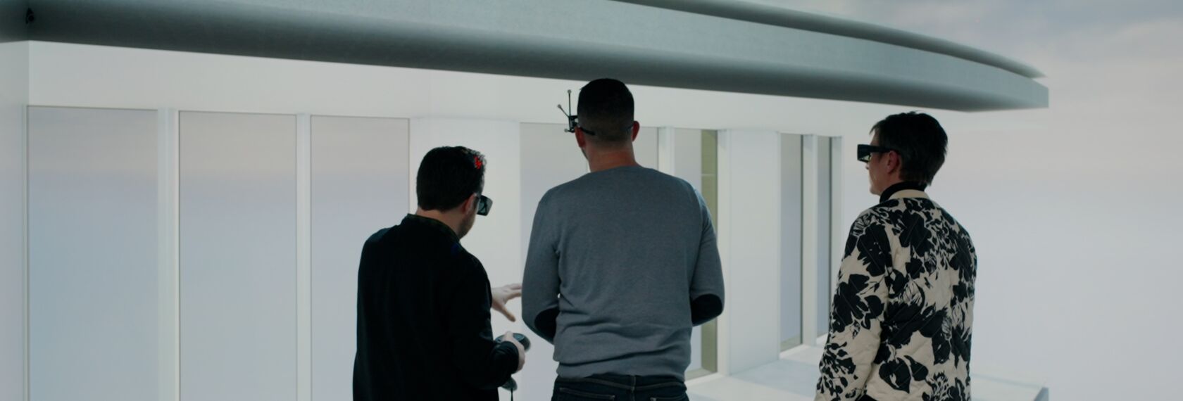 three people with vr-goggles