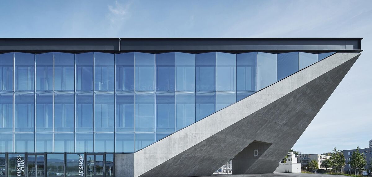 thermfix vario Facades, fuego light Windows, unico Doors, fuego light Doors and unico Windows - La Tuilière football stadium located in Lausanne, Switzerland